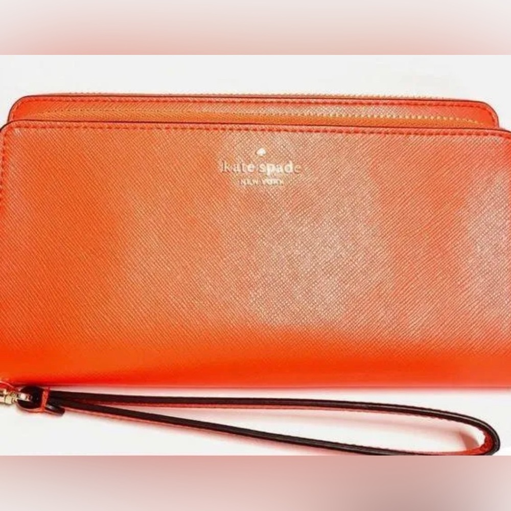Kate Spade NWOT Payton Large Carryall Wristlet ( slight damage read details)